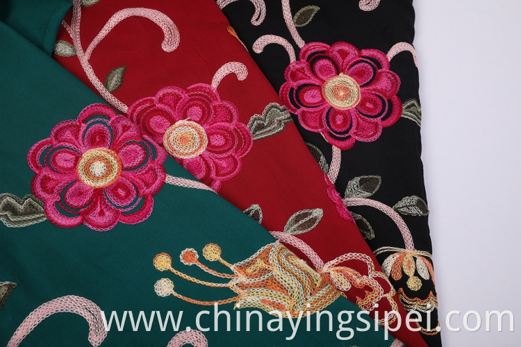 Good quality woven clothes rayon embroidery fabrics price for dresses